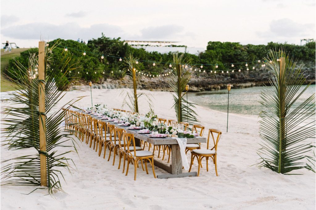 wedding reception table on the beach in the bahamas