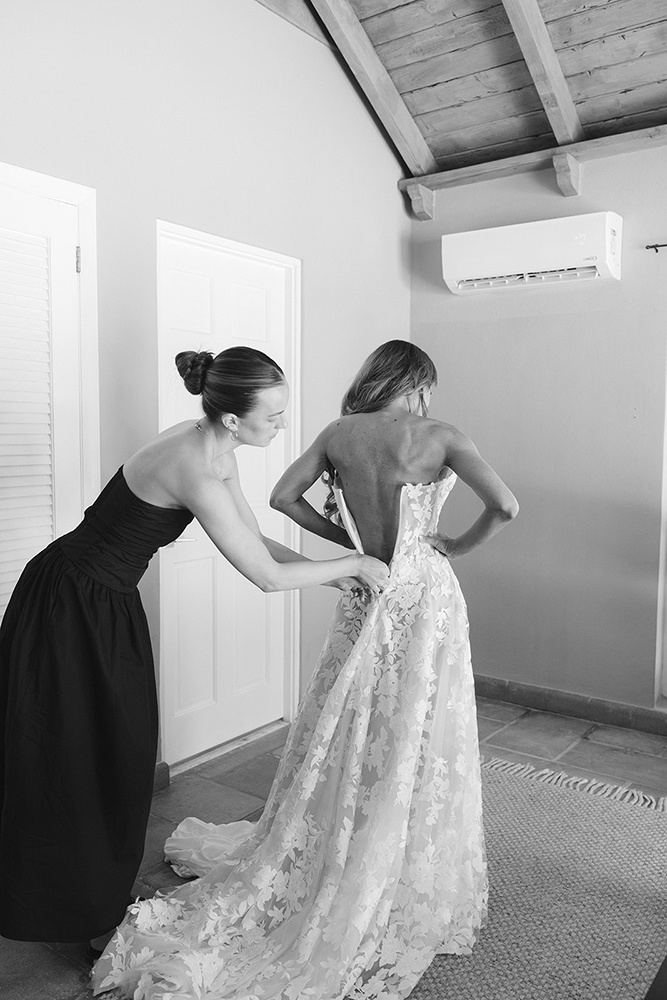 Bride getting dressed at Jack's Bay Club Eleuthera