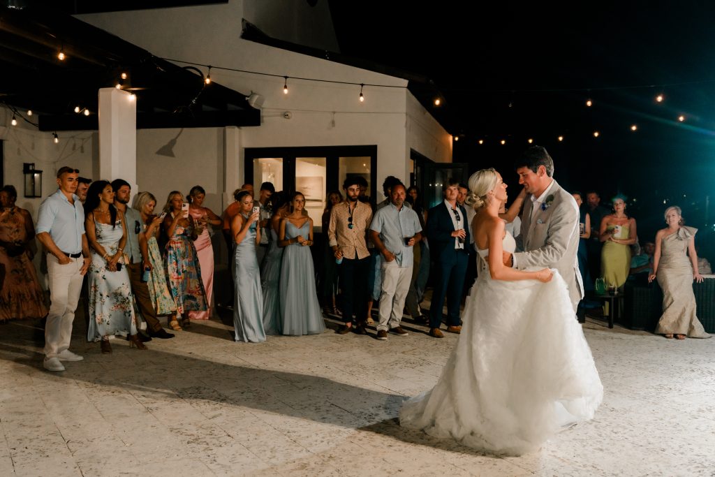 Bride and groom dancing at an outdoor wedding venue in Exuma, Bahamas