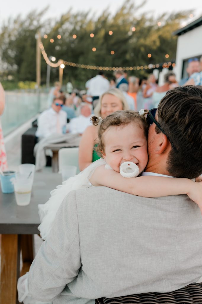 Sweet toddler during an Exuma, Bahamas wedding reception