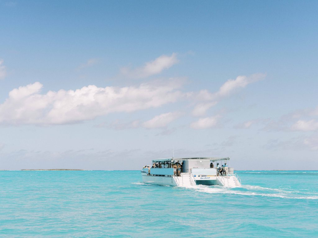 Catamaran sailing out to sea in the Bahamas