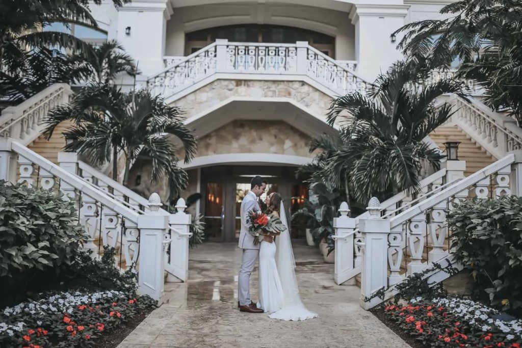 Newlyweds pose at Rosewood Baha Mar wedding venue